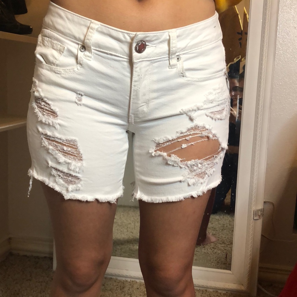 White distressed shorts